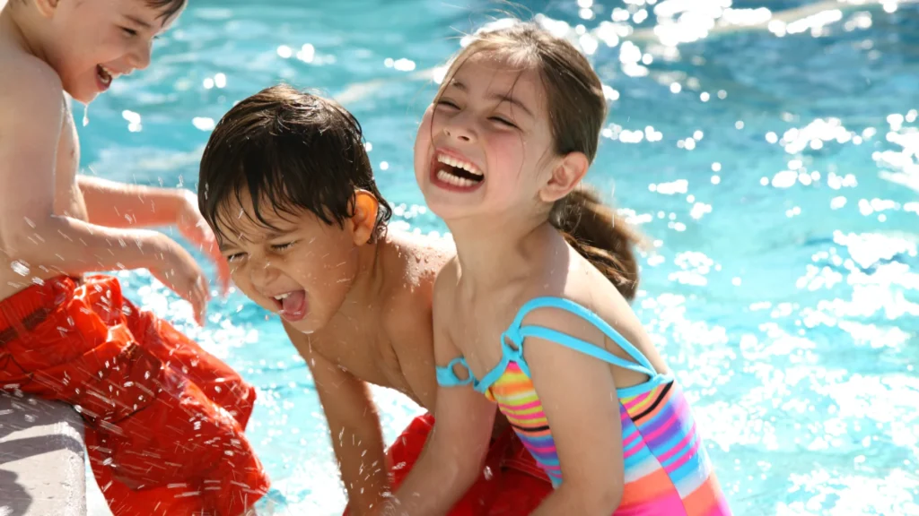 Kids Having Fun at Pool While DAD shares the Monday Jokes for an extreme Fun