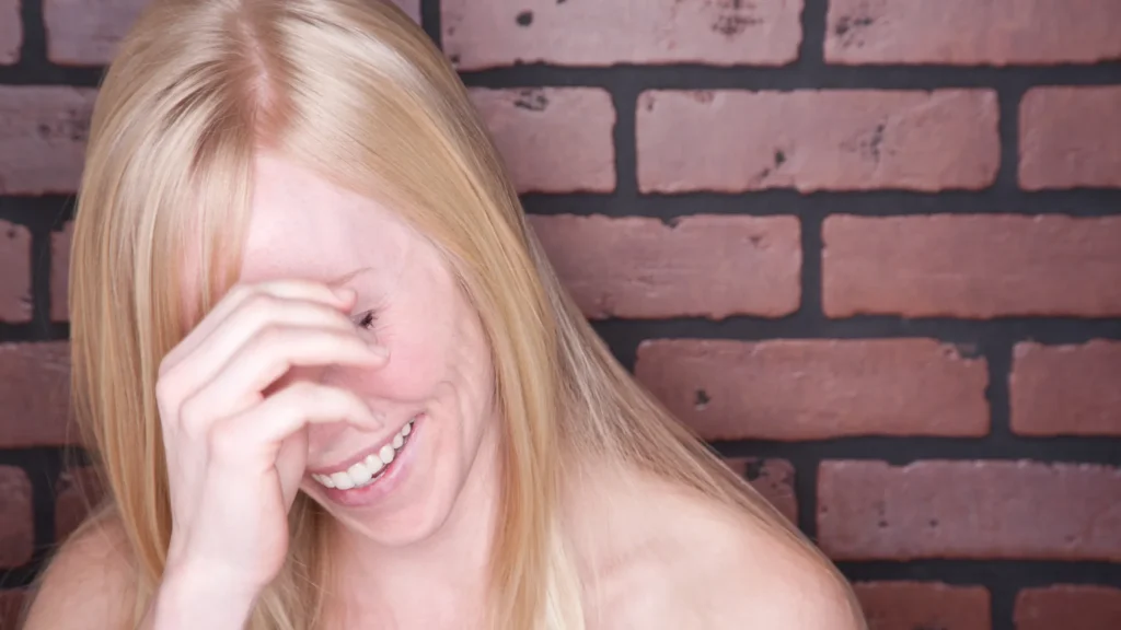 Girl Giggling as her father shares Wednesday jokes to make her giggle