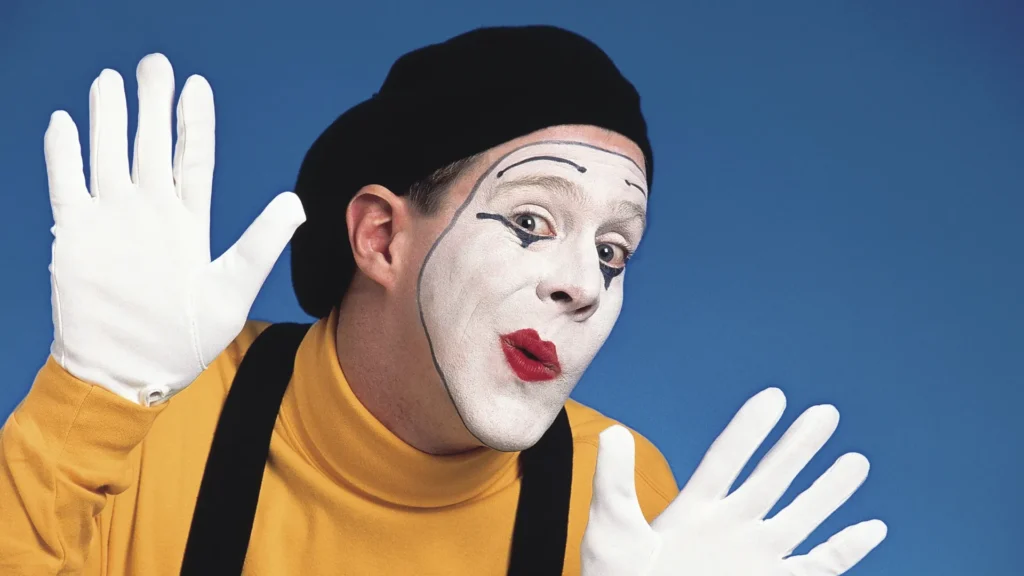 Funny Mime making Odd Faces to make people Laugh